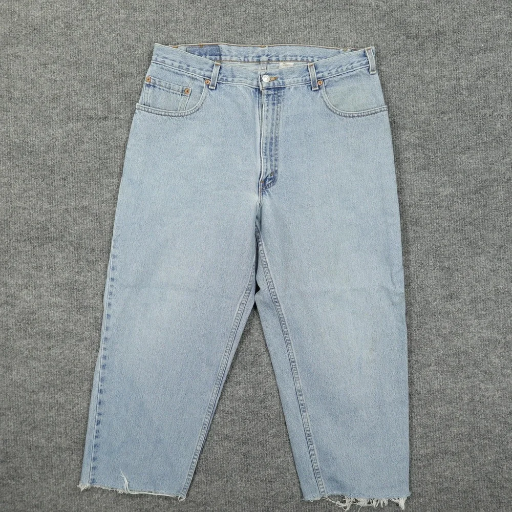 Vintage Levis 560 Jeans Mens 36x26 Light Wash Blue Relaxed Tapered Raw Hem